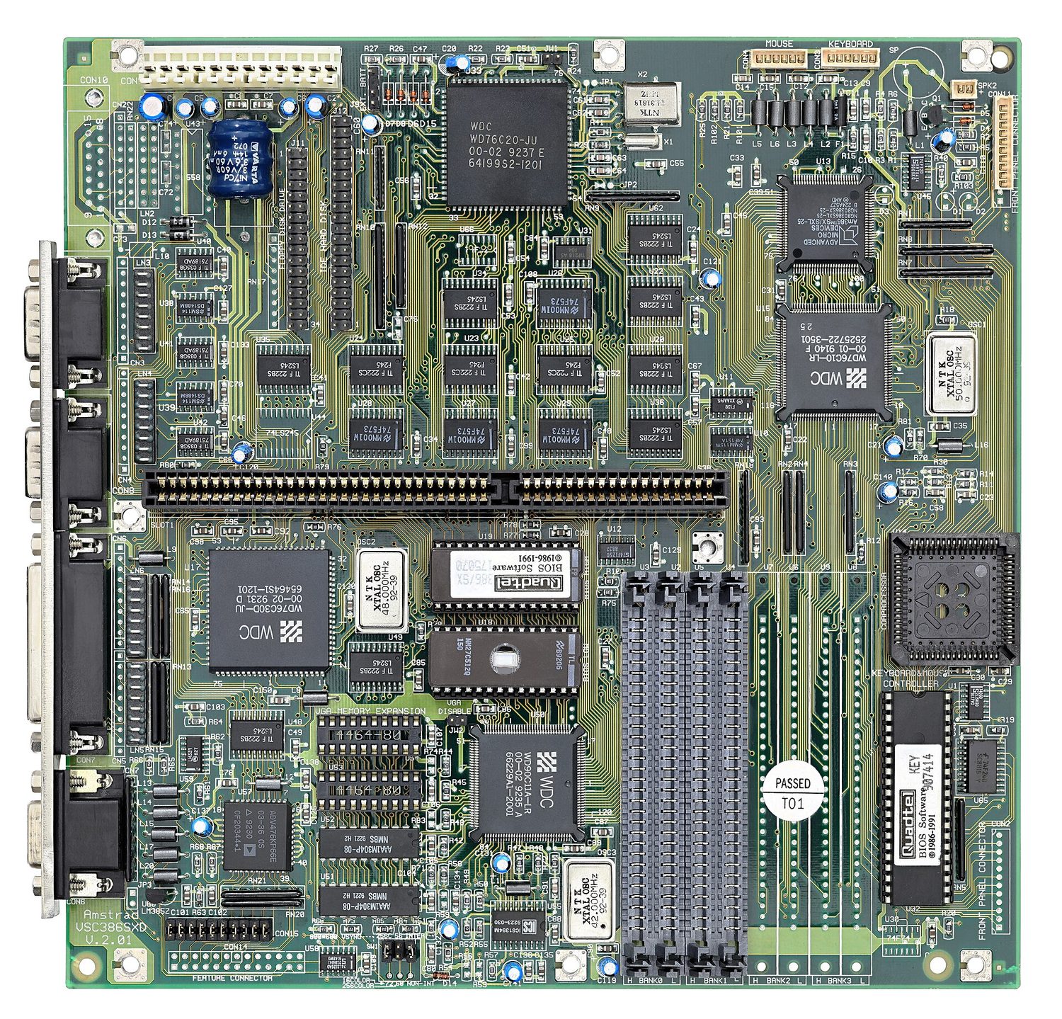 A motherboard seen from above: the CPU socket, memory slots and expansion slots joined by dense printed tracks