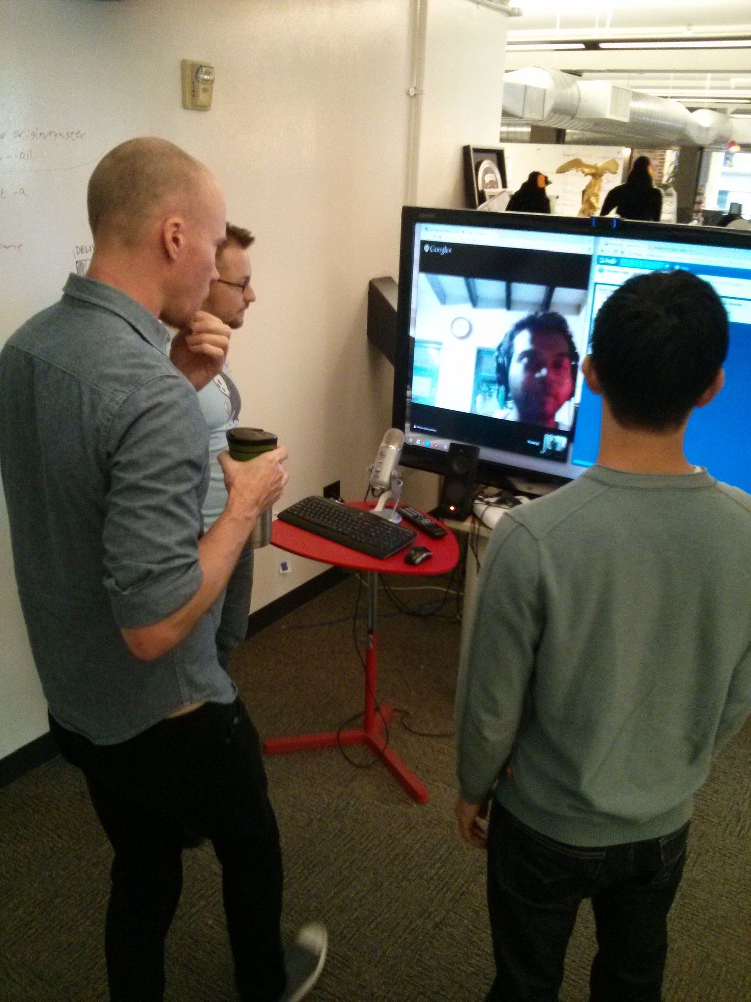 A software team collaborating around a table