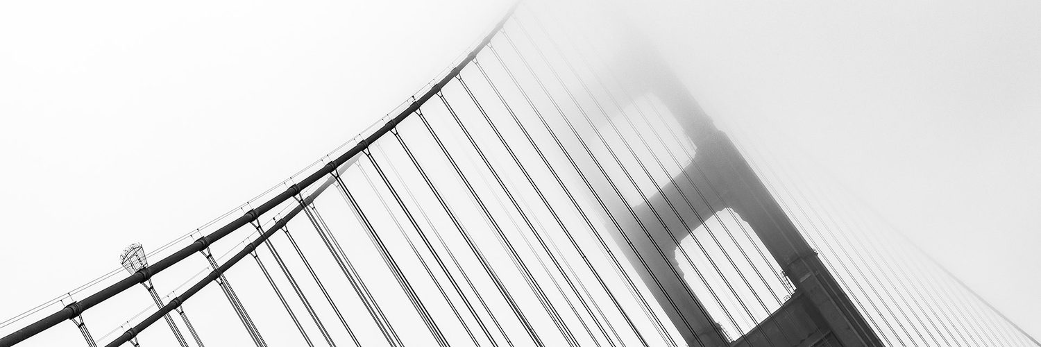 A suspension bridge: the main cable hangs in a parabola