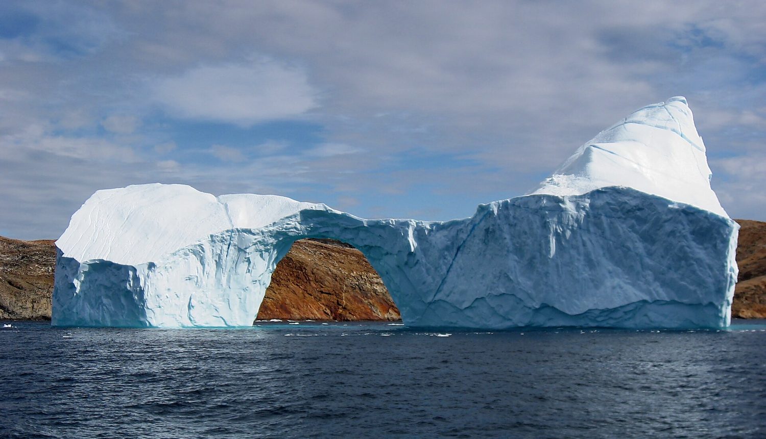 Ice floats on water because hydrogen bonding makes solid water less dense than liquid water