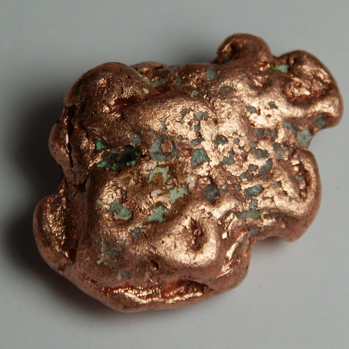 Native copper: metallic bonding gives a shiny, malleable solid with delocalised electrons