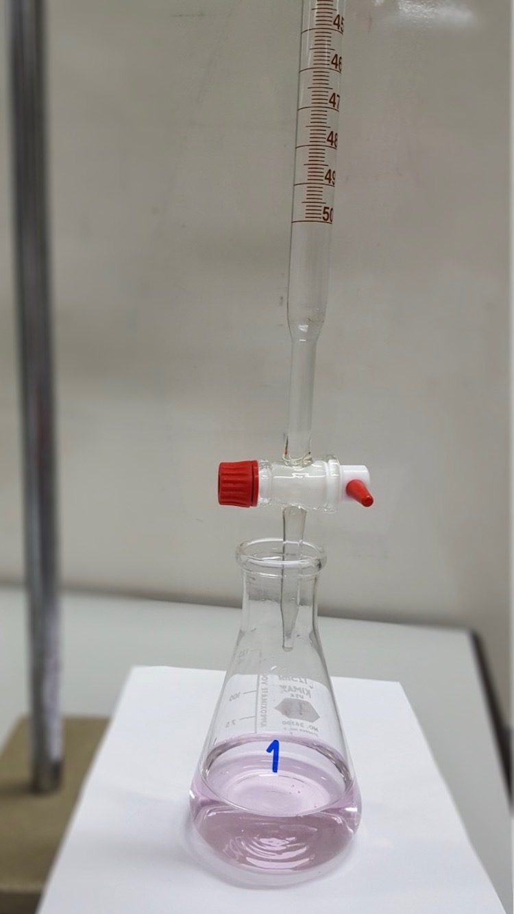 A titration setup: reacting volumes from a burette find the concentration of an unknown solution