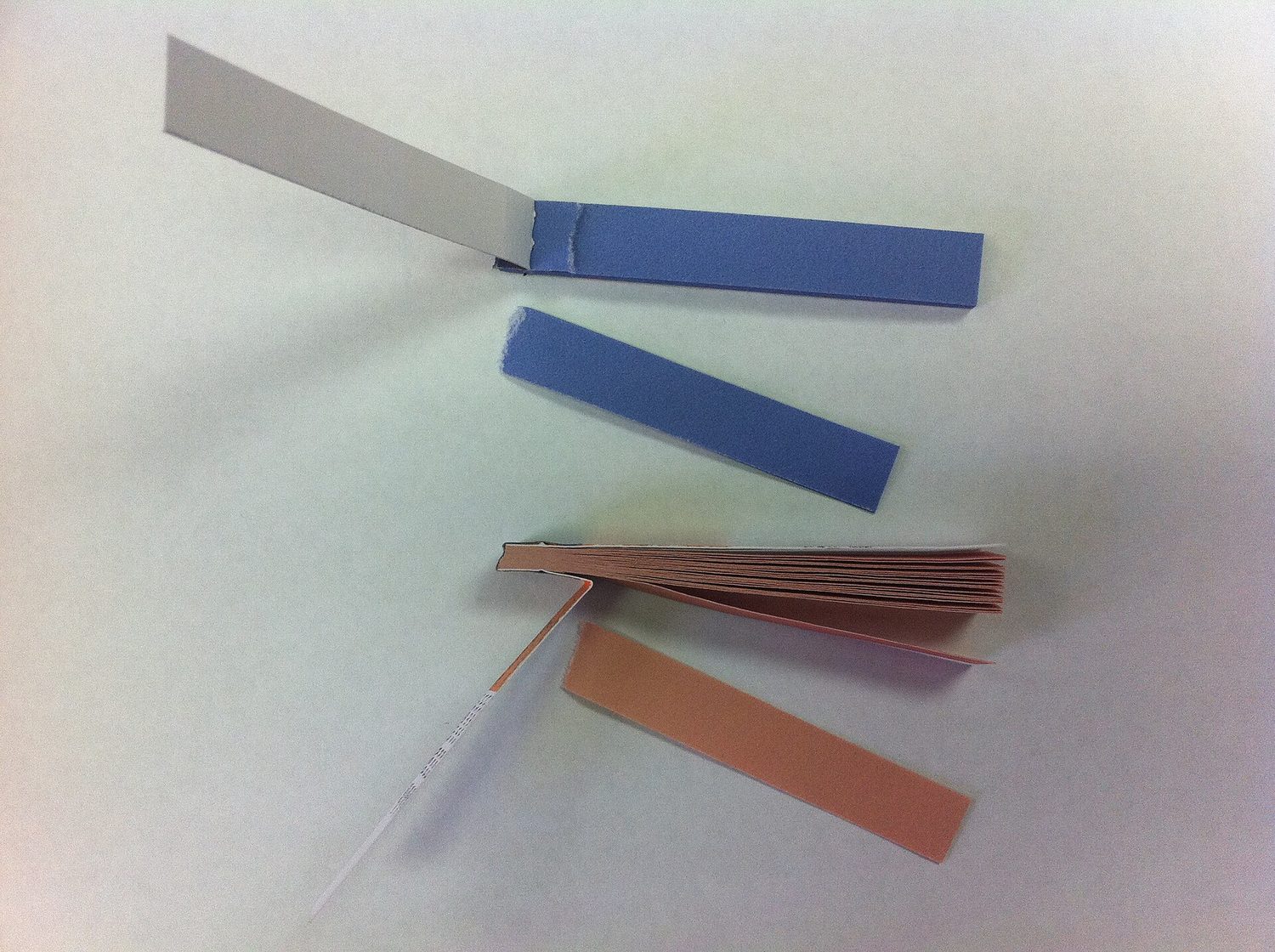 Litmus paper: acid–base indicators change colour with H⁺ concentration (pH)