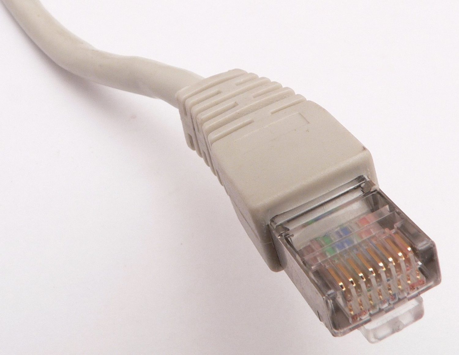 An RJ45 Ethernet connector — physical links carry packets across the Internet