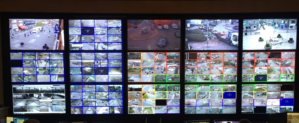 A CCTV control room: surveillance systems trade safety gains against privacy concerns