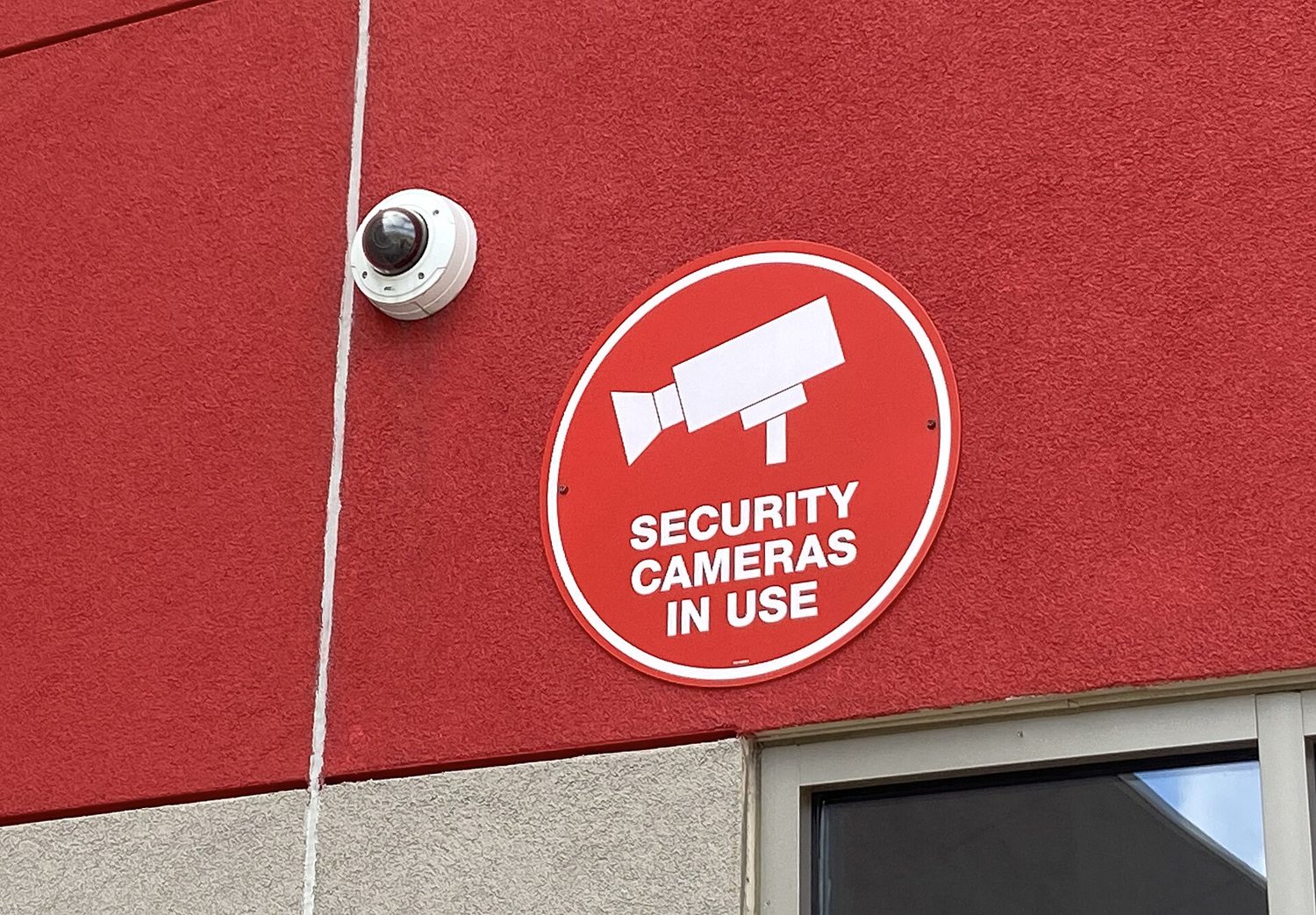 A dome security camera: physical controls and monitoring protect spaces as well as networks