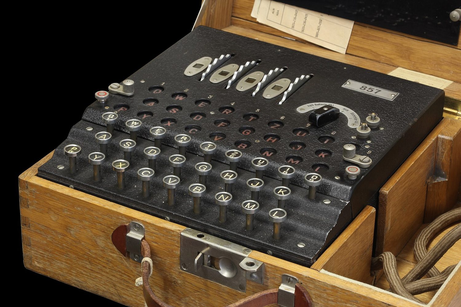 A World War II Enigma cipher machine with keys and rotors