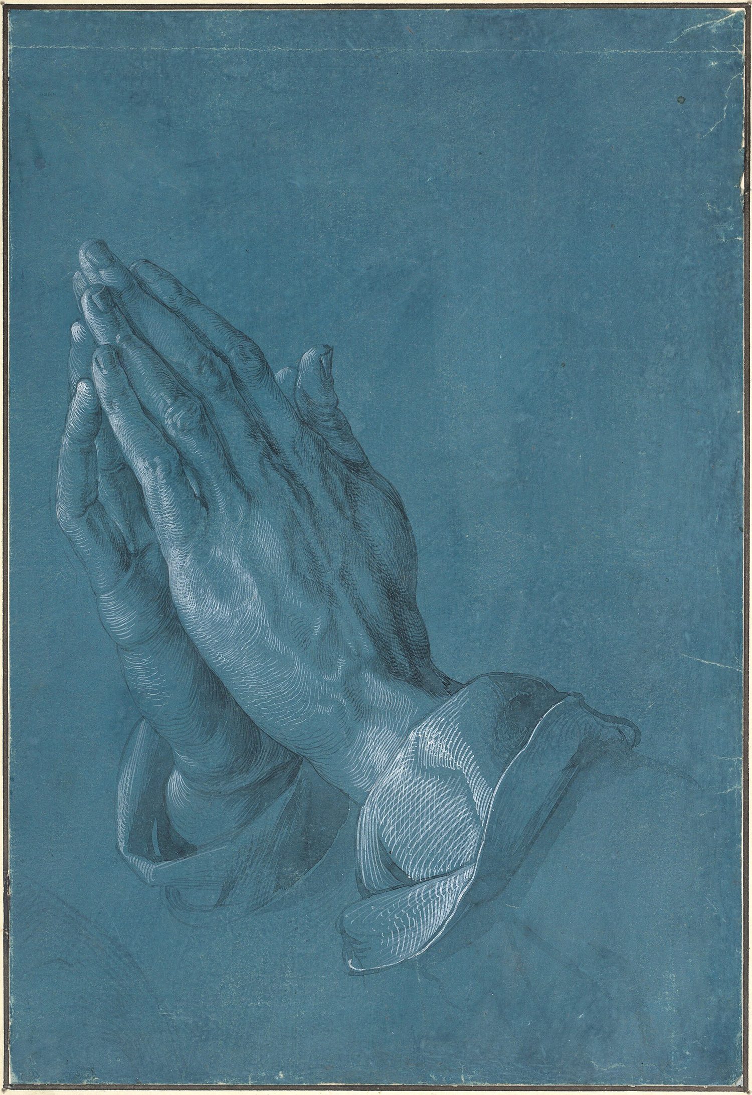 Dürer drew on blue-toned paper, adding white highlights and dark lines to the mid-tone ground