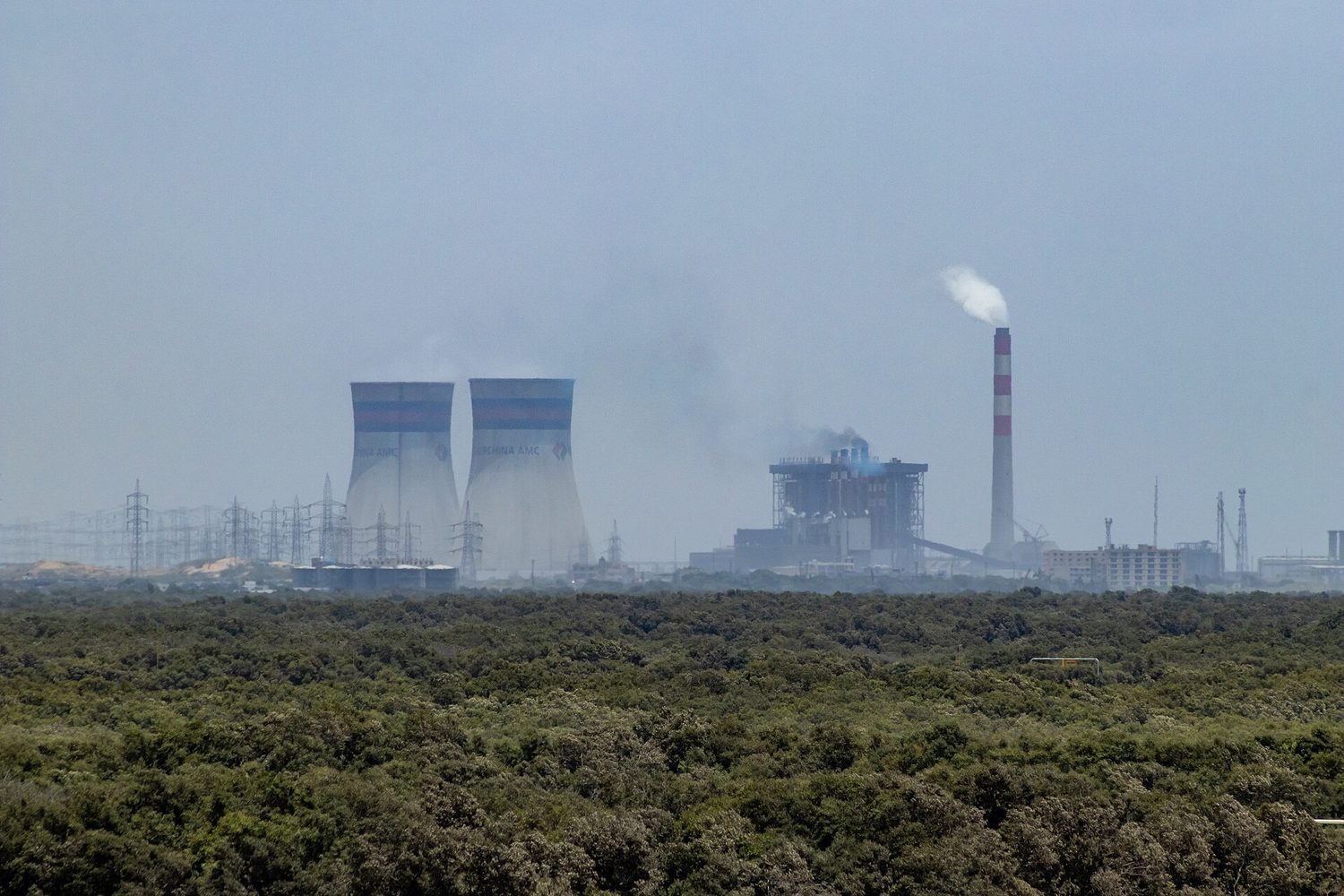 A large utility plant: monopoly and market power mean a single firm can set price above marginal cost