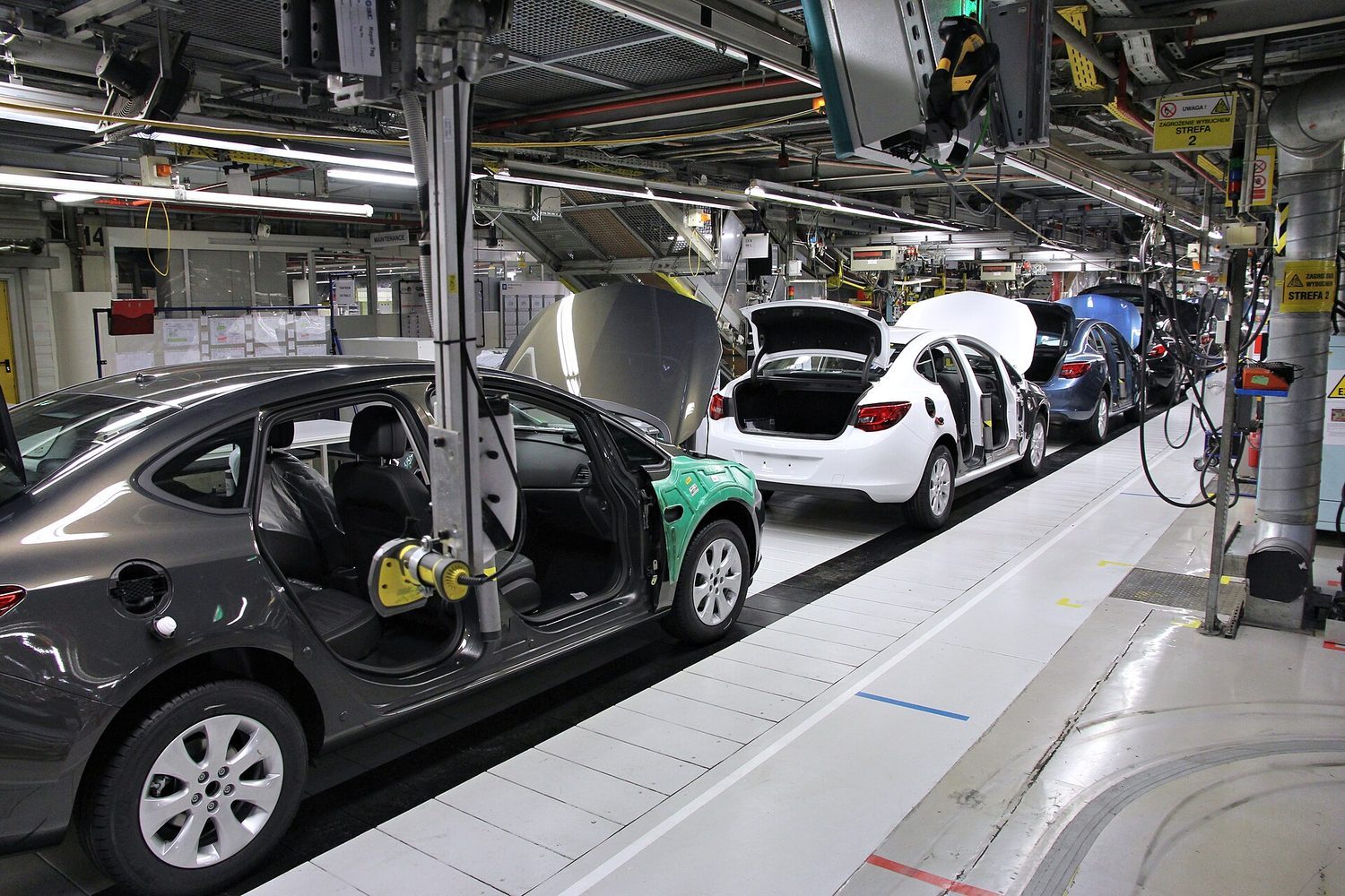 A car assembly line: firms hire labour until the marginal revenue product equals the wage