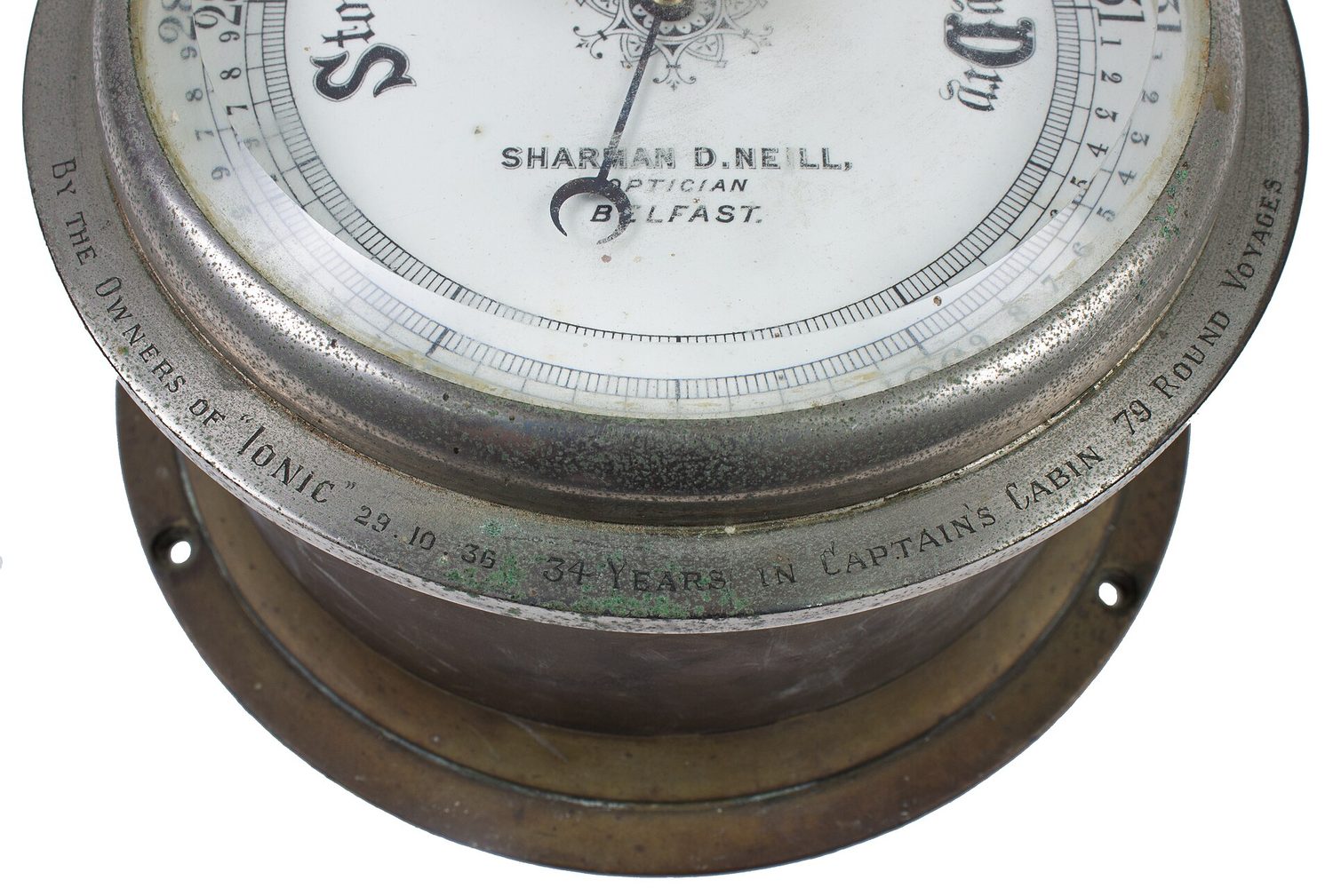 An aneroid barometer with a circular dial