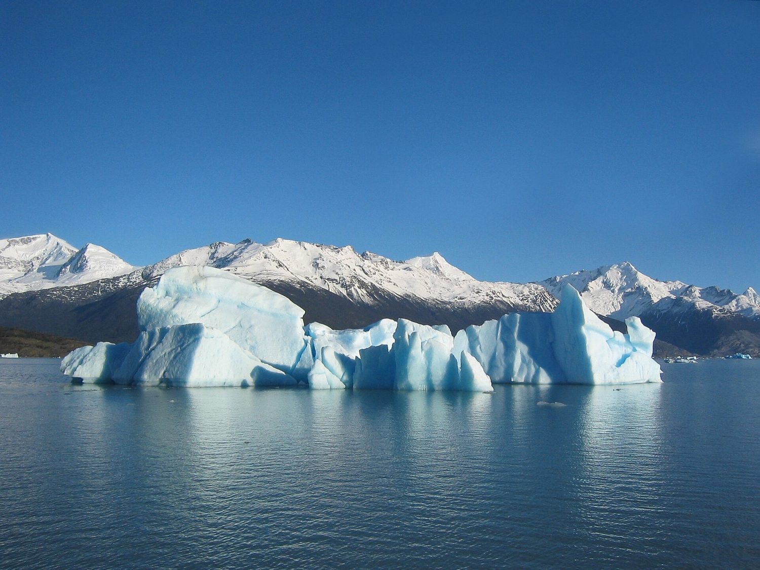 An iceberg: heat, density and phase changes connect thermodynamics to fluids and buoyancy