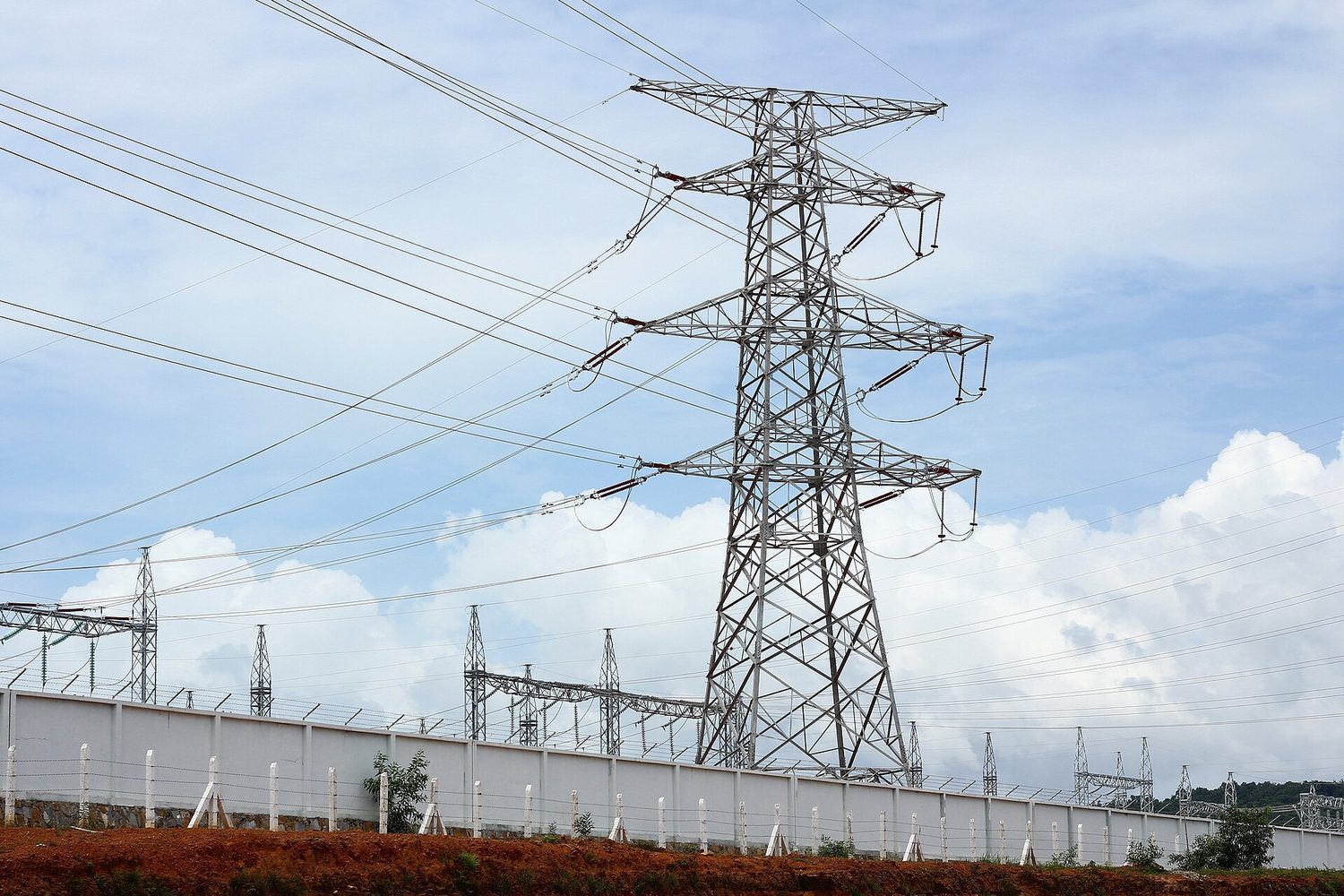 High-voltage power lines: electrical power is transmitted as high voltage so current (and I²R loss) stays low