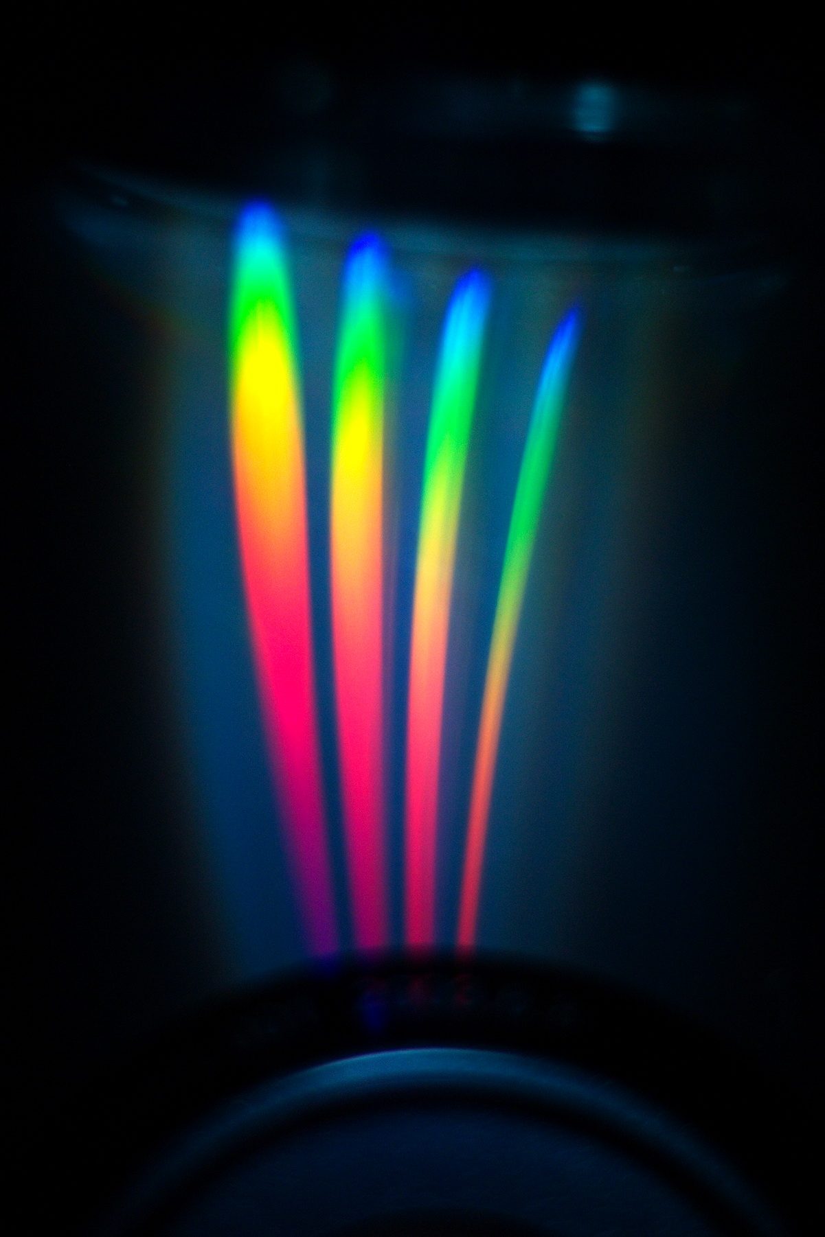 Rainbow colours reflected from the surface of a CD