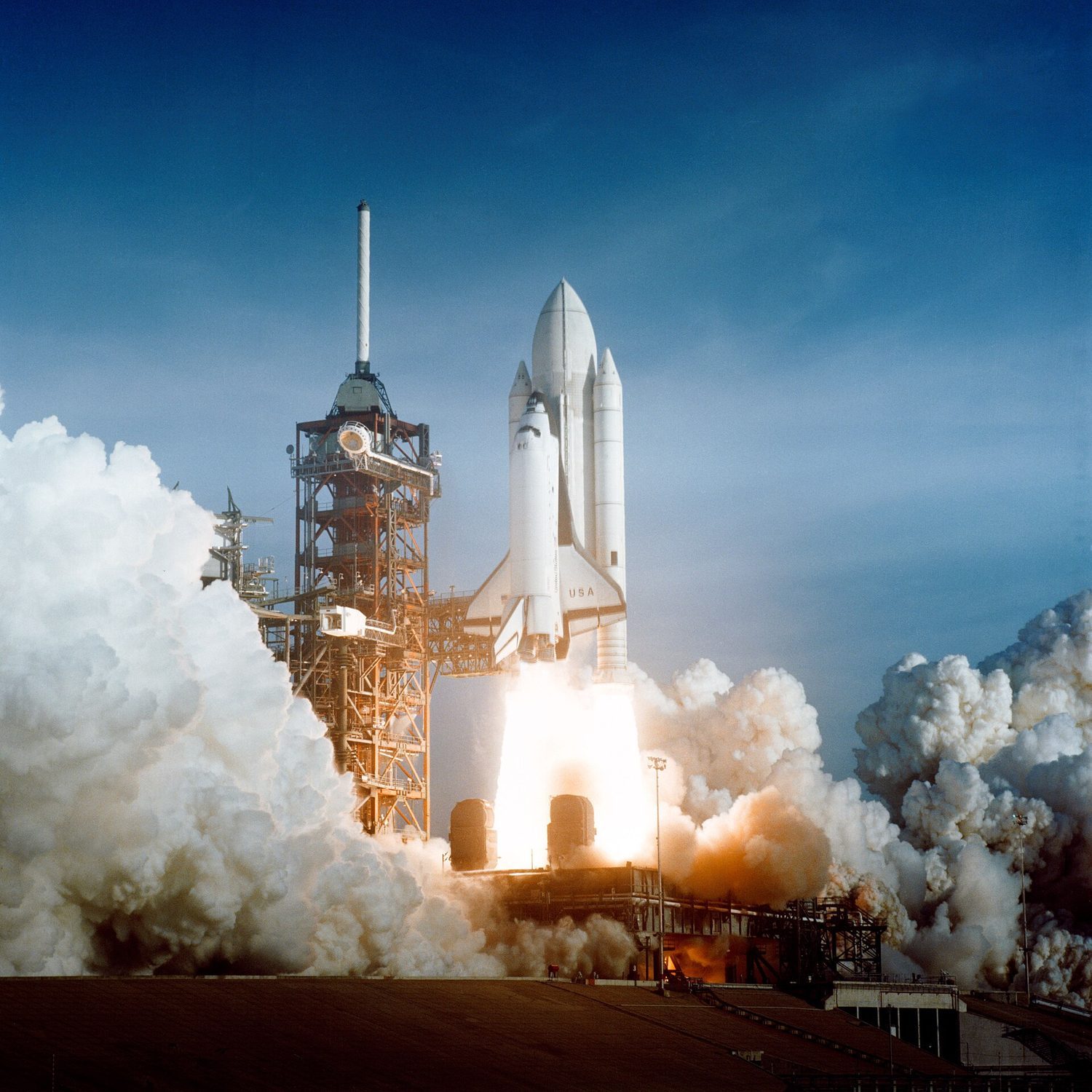 A rocket launch: net force changes momentum — F_net = ma for translational dynamics