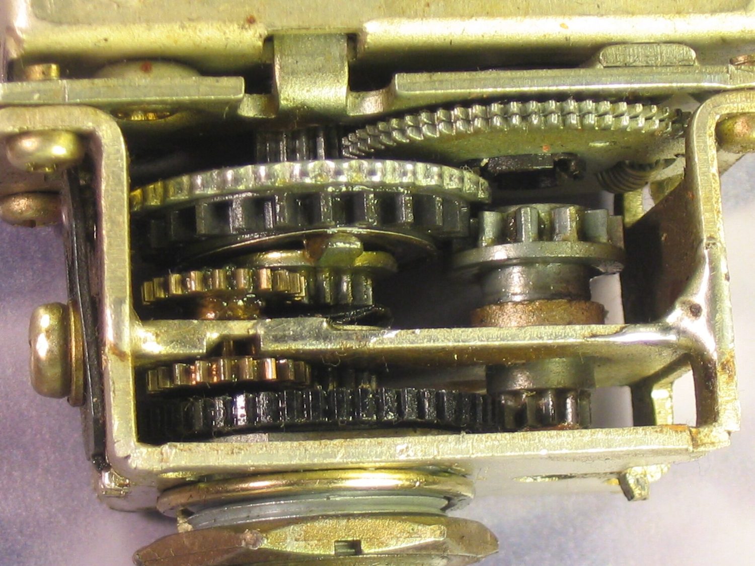 A gear train: torques and rotational inertia couple through the gear ratio