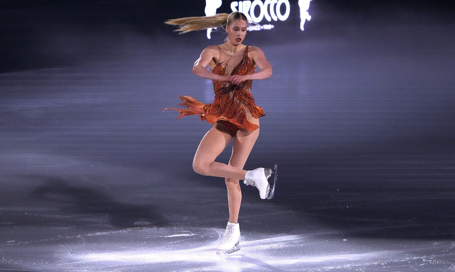 Figure skaters performing on the ice
