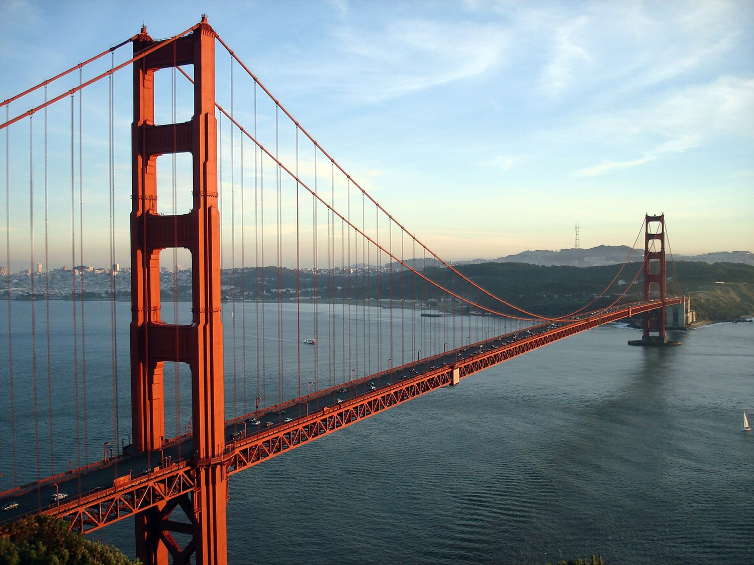 A smooth bridge curve: polynomial and rational graphs model real shapes with asymptotes and turns