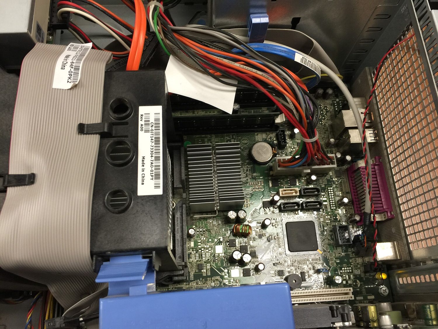 The motherboard and the parts attached to it are hardware — the physical parts of a computer.