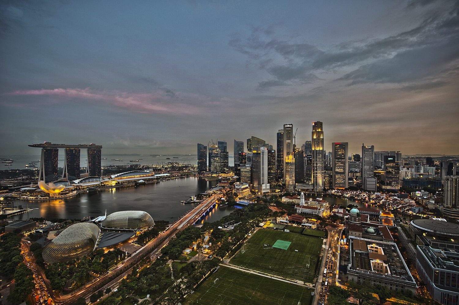 A modern city skyline of skyscrapers at dusk