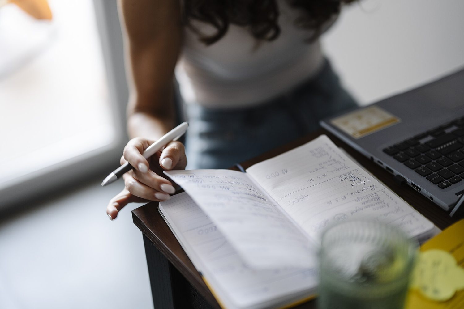 Writing at a desk: decide purpose and audience before you organise ideas on the page